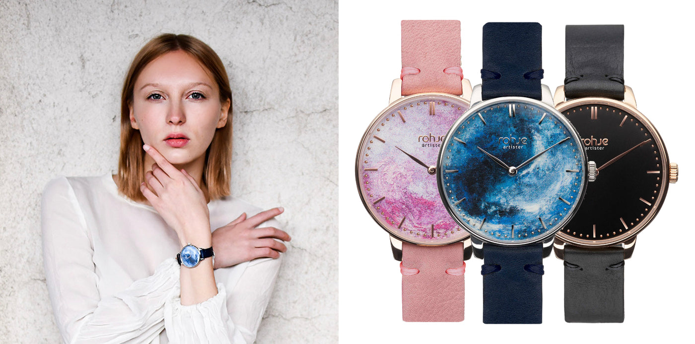 Nainen joka pukeutunut siniseen ja hänellä on ranteessa Rohje Artister -rannekello