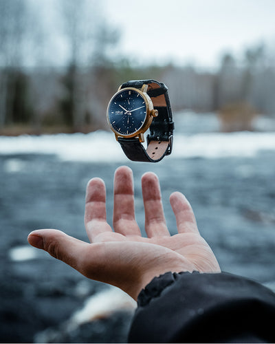 hand throw watch in air adventurister gold